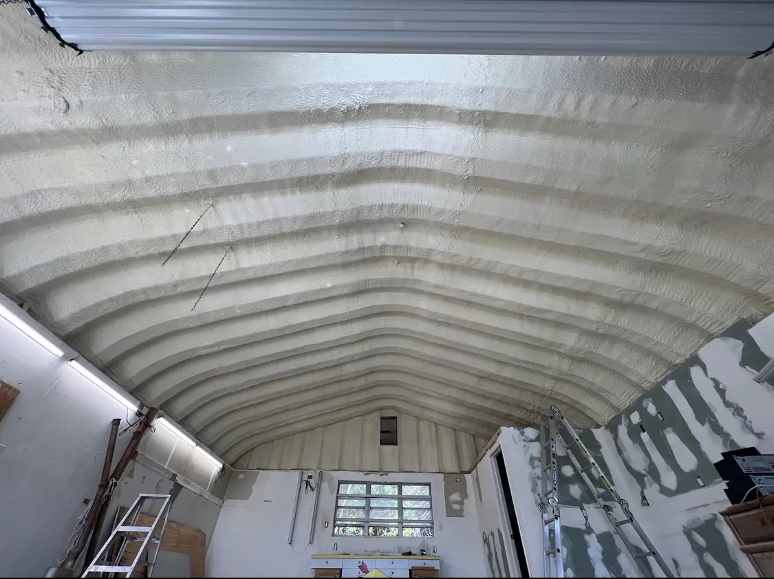 Spray polyurethane foam applied to the underside of a metal roof deck in Shawangunk